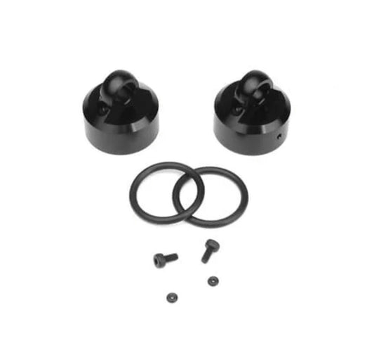 TKR8702 – Shock Caps (7075, emulsion/vented/standard, black ano, 2pcs)